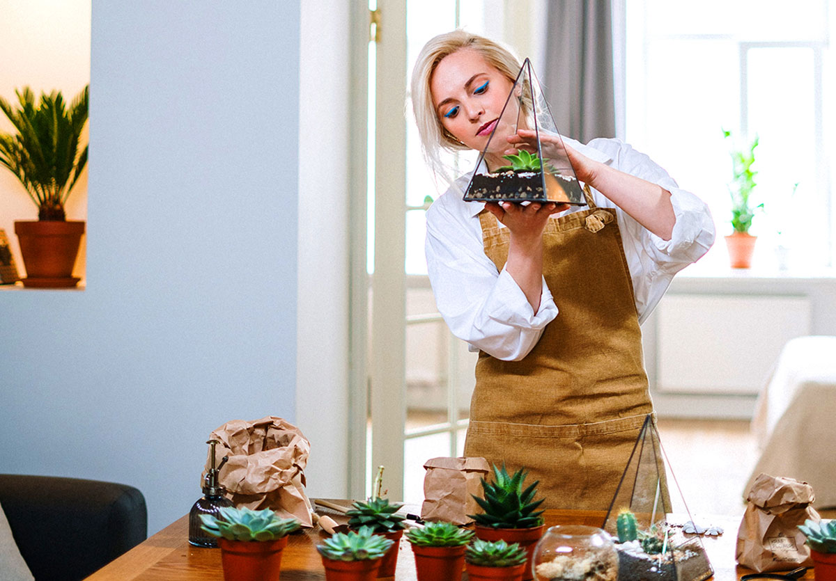 Woman making terrarium 2